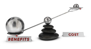 Two spheres with different sizes on a seesaw plus two signs cost and benefits over white background, marketing analysis concept or symbol